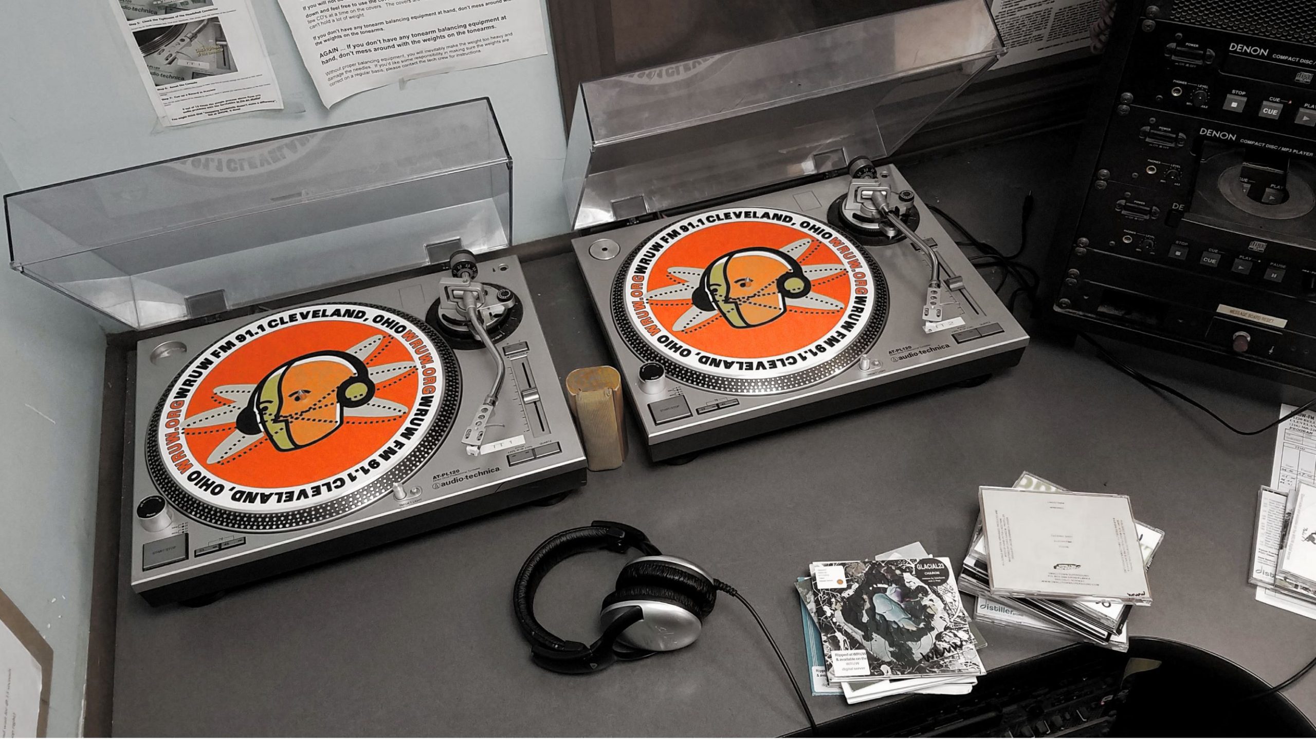 WRUW turntables with visible orange radio head logo